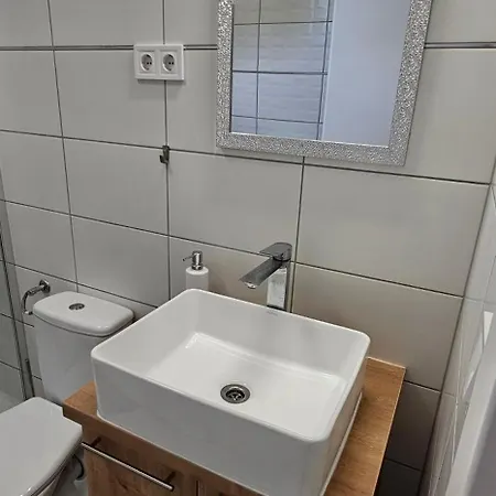 Kolokan Apartmanhaz Gazde/Camere de închiriat